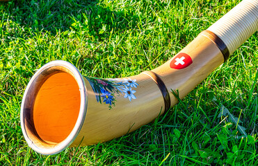 Close up of Swiss Alphorn in Appenzell Region, Switzerland. The musical instrument alphorn or...