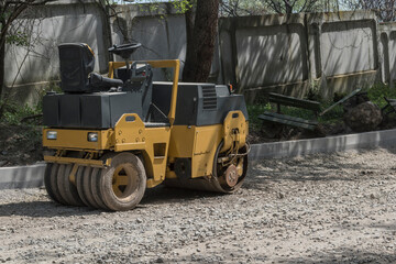 Asphalt machine that is on the road and is ready to work.
