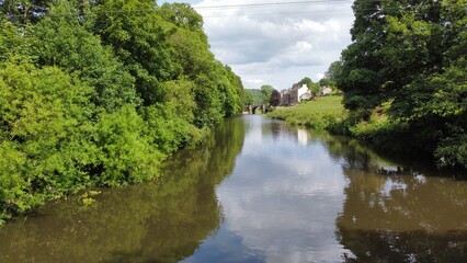 Fototapeta na wymiar Looking down the river Calder in Whalley Lancashire. Drone image. 