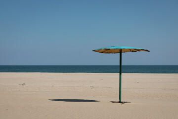 beach umbrella and chairs