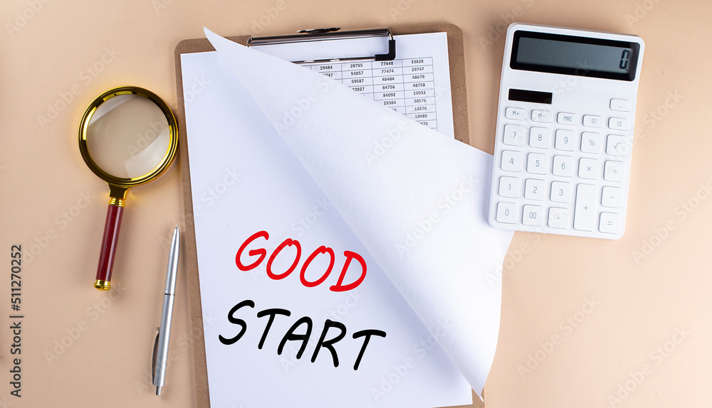 Poster clipboard with chart and text good start with magnifier ,calculator on beige background