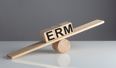 GDP on a wooden cubes on a wooden balance , business concept