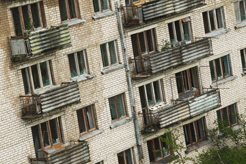 Exterior of abandoned apartment building in european ghost town.