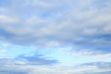 Naklejka na ściany i meble Beautiful tranquil blue sky with clouds