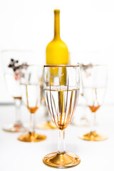 bottle of wine and glasses on a white background