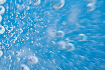 Water. Movement of air bubbles blue beautiful abstract underwater background