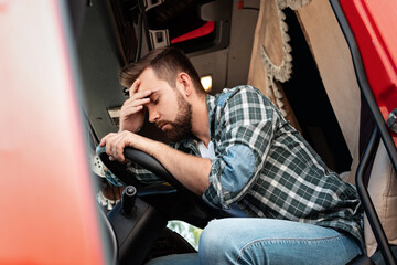 Tired truck driver feeling sleepy and sick
