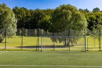 Fototapeta premium empty forts on the football field in summer