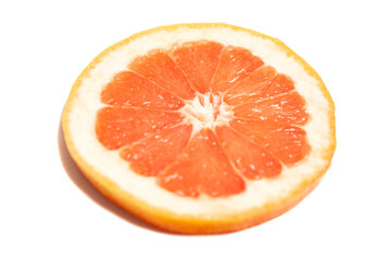 slice of fresh grapefruit isolated on white background