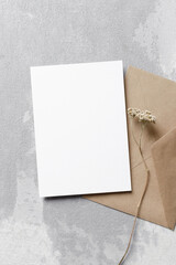 Wedding invitation card mockup with envelope and dry flowers