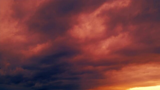 backdrop of heavy red lighting sunrise clouds - loop video