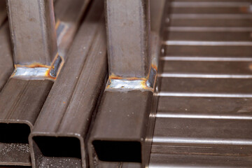 Metal square profiles welded in the frame. Welding work in production.