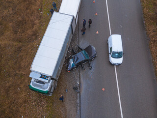 Severe accident. Traffic accidents on the road. View from above. The car got into an accident....