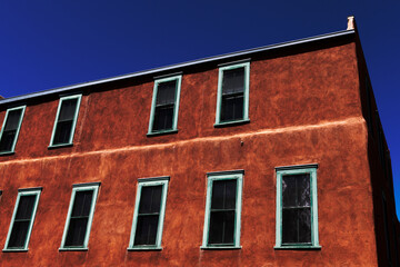 A pueblo style red building