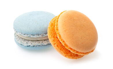 Orange and blue macarons on isolated white background