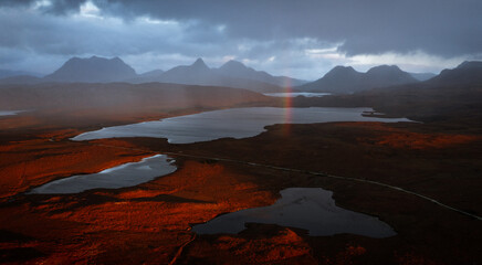 Last light over the Scottish Highlands with rainbow.  Moody Scotland. Drone, Aerial Ullapool