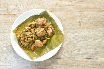 steamed chicken curry with banana blossom and mixed vegetable Thai northern style food on plate