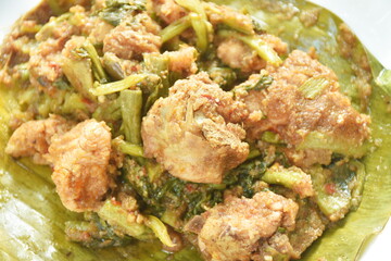 steamed chicken curry with banana blossom and mixed vegetable Thai northern style food on plate