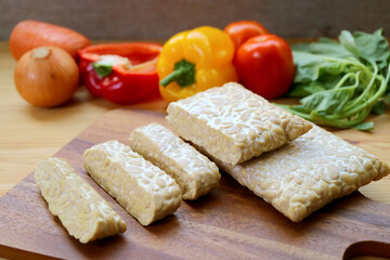 Heap of Cut Fresh Tempeh for Cooking Whole Foods Plant-based Dishes