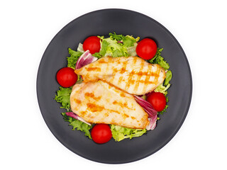 Grilled chicken breast with green salad and tomatoes isolated on white background