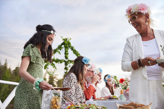 Family having midsummer dinner