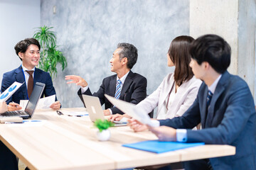 Business persons having a meeting in office