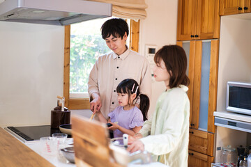 Obraz premium Family cooking together at home