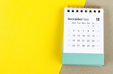 December 2022 desk calendar on beautiful background.