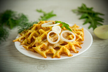 fried potato cheese vegetable waffles with bacon and onions