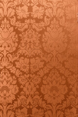Retro floral ornamental victorian wallpaper fabric in orange full frame repeating