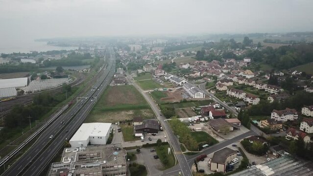 Drone view of highway and Morges town, Switzerland next to geneva Lake. aerial shot