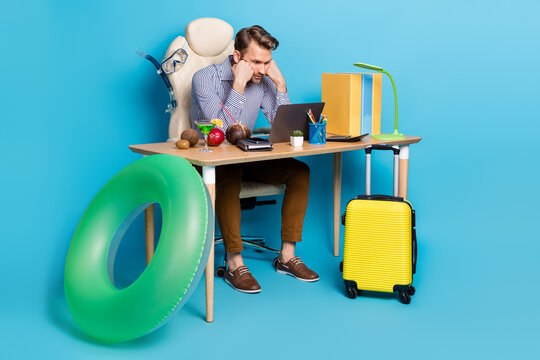 Photo of negative mood young man office worker dreaming about vacation tired of work isolated on blue color background