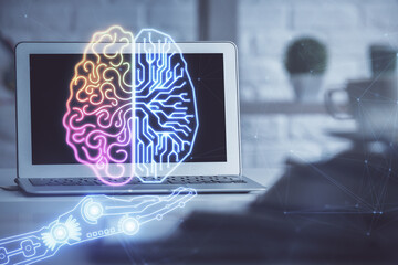 Double exposure of work space with computer and human brain drawing hologram. Brainstorm concept.