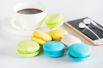 Cup of Coffee Colored Macaroon Smartphone on White Background Horizontal LifeStile Background