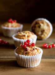 Homemade Tasty Muffins with Red Currant and Apple on Wooden Background Vertical Dessert