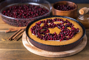 Delicious Tart or Pie with Cranberry Homemade Pie or Dessert Autumn Bakery Wooden Background...