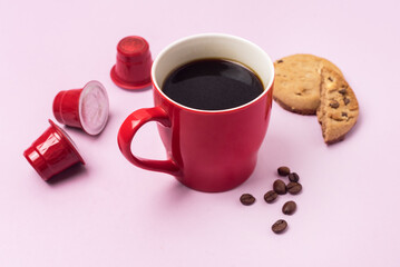 Red Cup of Coffee Cookies and Red Capsule Coffee Morning Breakfast Concept Pink Background Horizontal