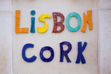 Street sign of souvenir store with souvenir from oak cork in Lisbon