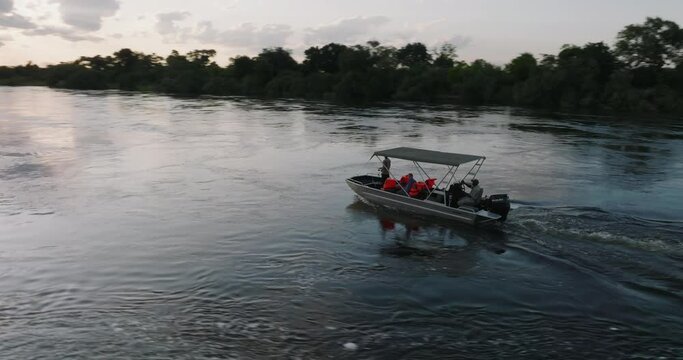 Aerial view of a tourist boat sightseeing on the Zambezi River