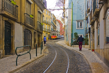 Naklejka na ściany i meble Famous 28 yellow tram in Lisbon