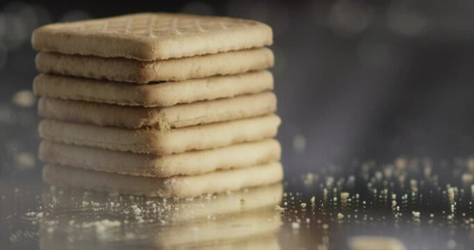 A cookie are broken on a tower of cookies