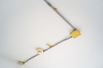 Installation of electrical wiring on the ceiling