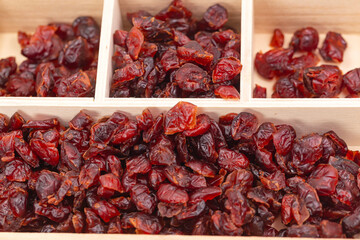 red cranberry dried in container prepare sevre healthy food.