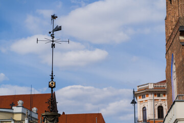 Fototapeta na wymiar Vane near blurred buildings on urban street in Wroclaw