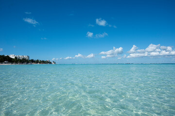 Panoramic view from the sea of the north beach in Isla Mujeres Mexico. Travel and tourism