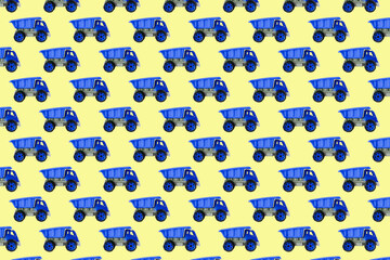 Colorful blue plastic dump truck, tip lorry, car toy isolated on yellow background still life seamless pattern,mockup, template, toys for children, boys, girls, kids development, playing, childhood