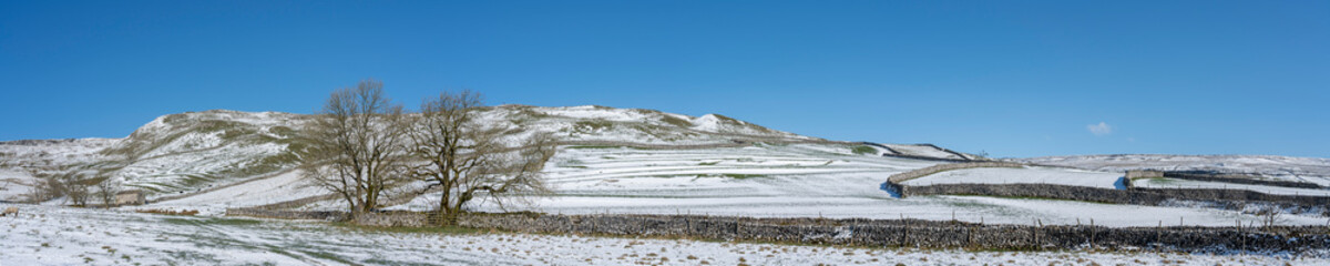 Snow covered Yorkshire Dales National Park winter panorama - 511328478
