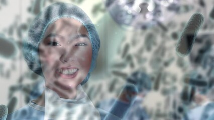 Animation of covid 19 cells over smiling biracial female surgeon in operating theatre - Powered by Adobe