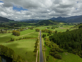 Road in the countryside of Waikato aerial drone view. New Zealand
