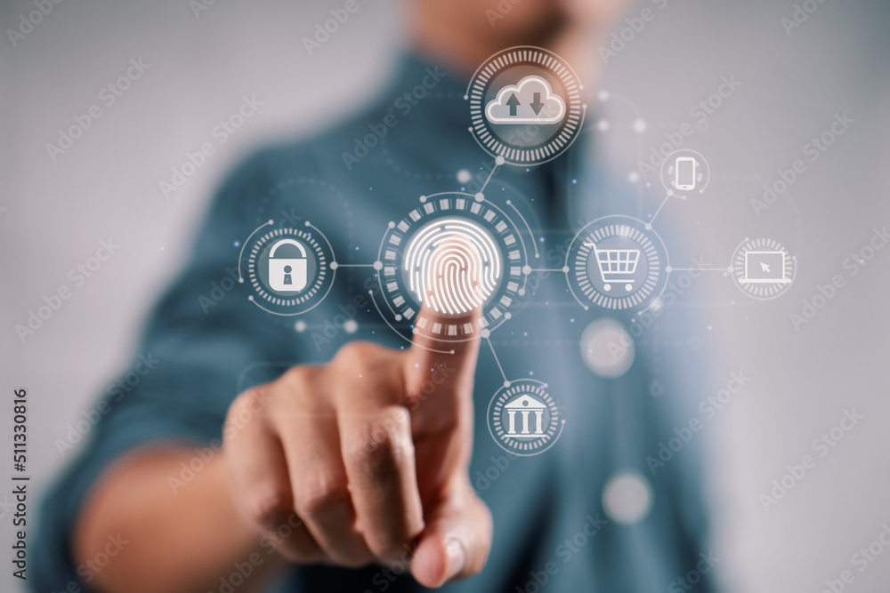 Aufkleber on a virtual screen, a businessman touches a fingerprint scanner to provide a secure interface for o